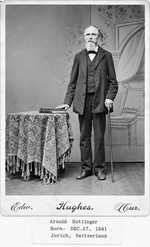 Cabinet card portrait of Arnold Hottinger, a bearded man in a dark coat